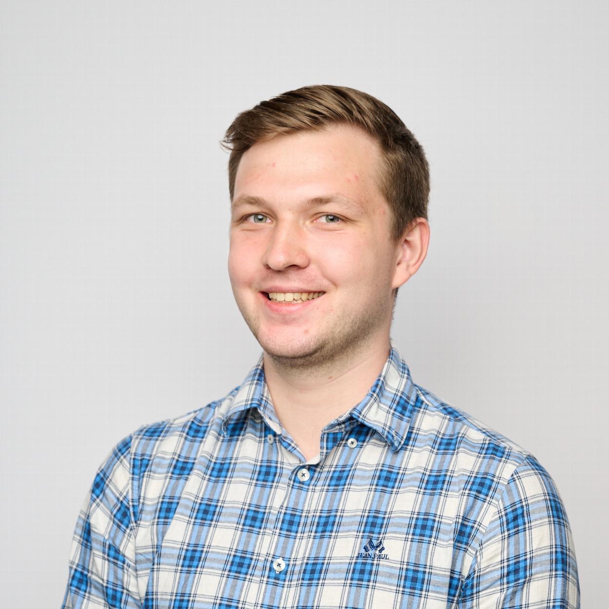 young man with blue shirt
